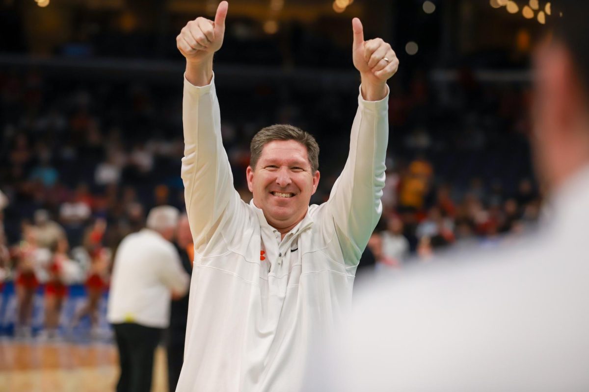 Clemson head coach Brad Brownell smiles during the Tigers game against New Mexico in the first round of the NCAA Tournament on March 22, 2024.