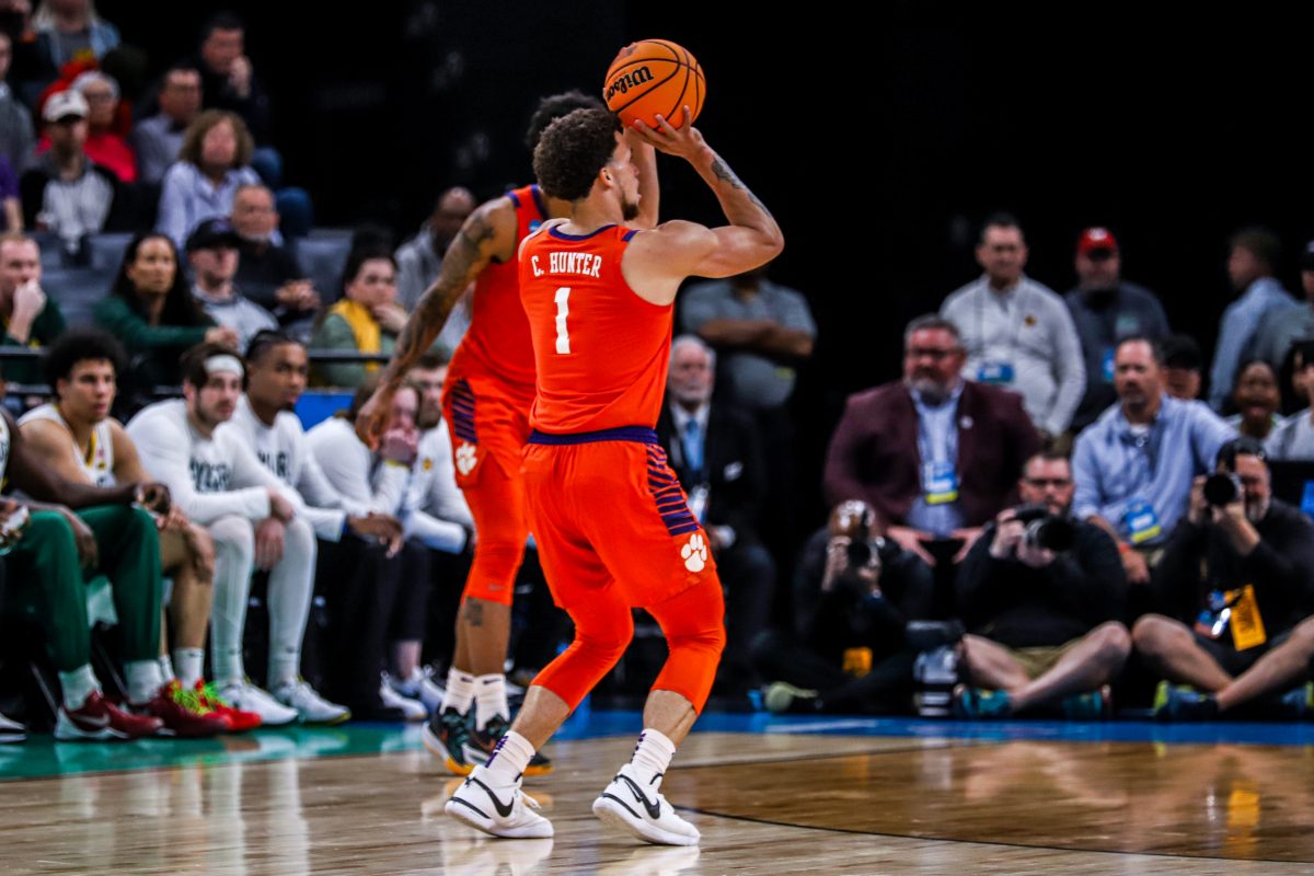 Clemson guard Chase Hunter (1) scored his biggest basket in the final minute of Clemsons win over Arizona, hitting an acrobatic and-1 to keep the Tigers in the lead. 