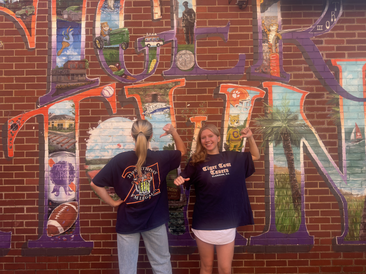Bridges and Eckle pose in their very one 21st birthday t-shirt from Tiger Town Tavern, voted best free thing in Clemson.