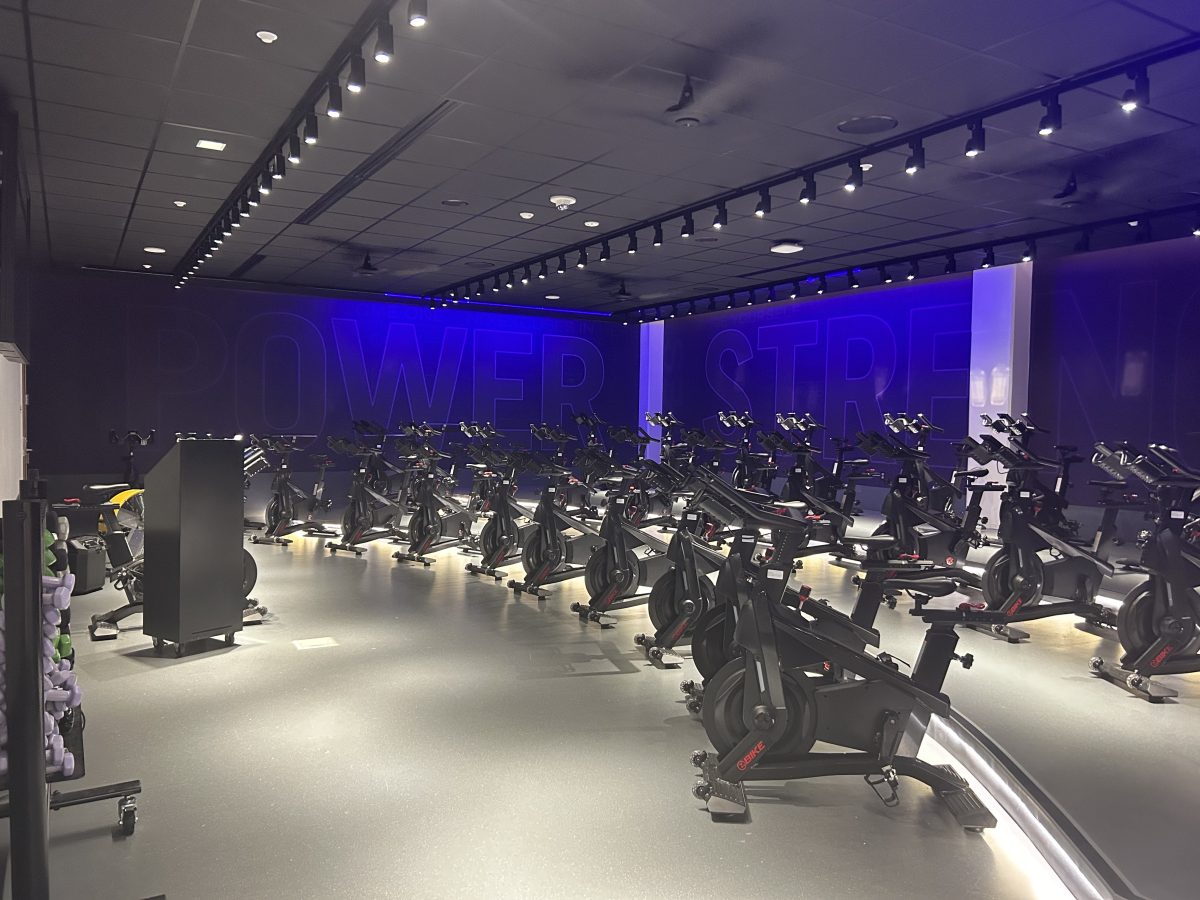 Cycle party features plenty of bikes for you and a friend to enjoy a group workout complete with weights, bands and music-controlled lights.