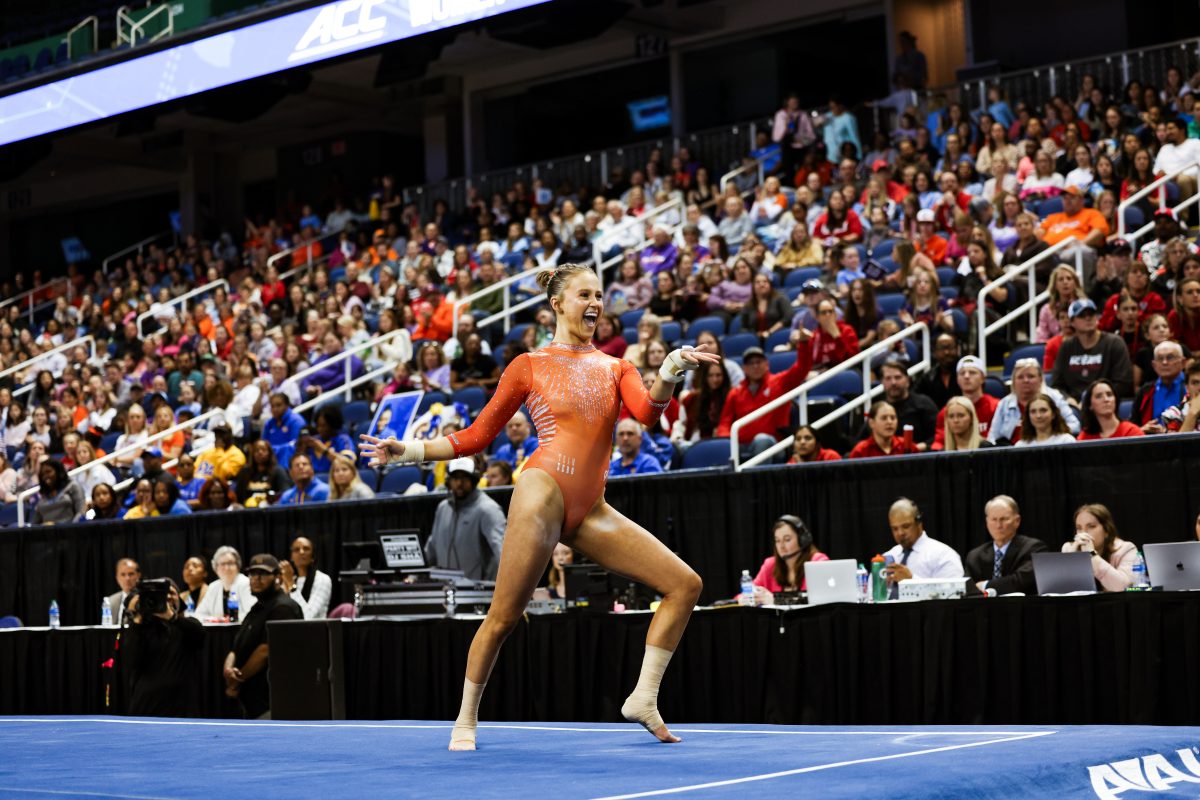 Molly Arnold competes on floor at the ACC Championship, where she went on to match her career high in the event.