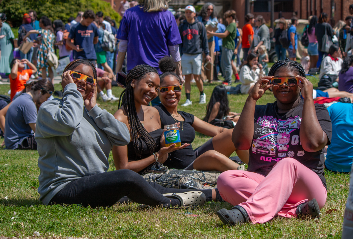 Clemson students gathered in the courtyard behind the Kinard Laboratory of Physics to watch the eclipse.