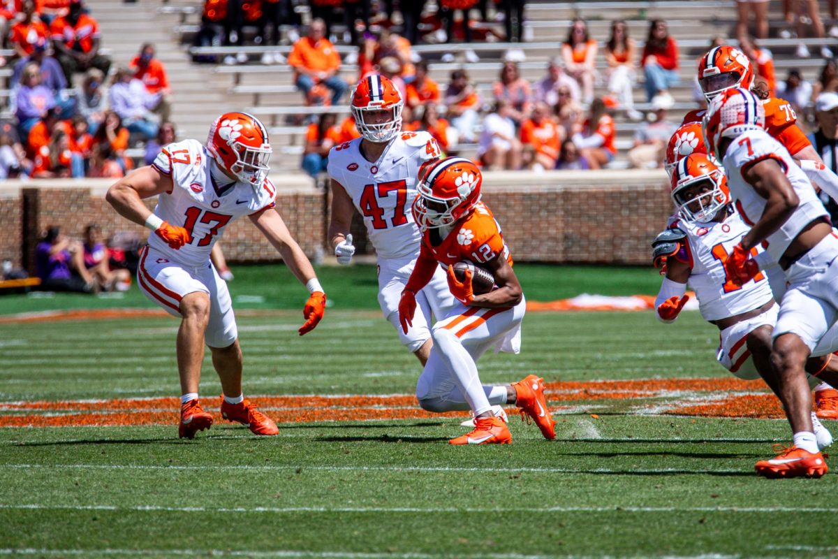 Wide receiver Bryant Wesco Jr. makes a cut during Clemson's annual spring game in Death Valley on Saturday, April 6, 2024.