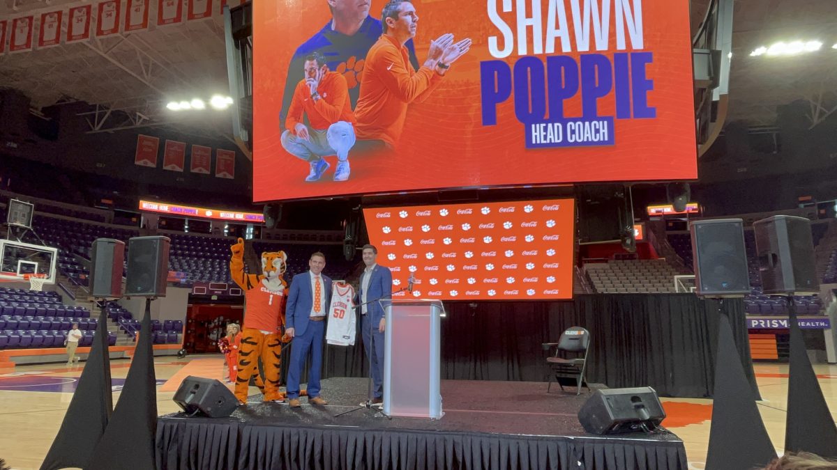 Shawn+Poppie+spoke+to+the+media+earlier+this+month+to+express+his+excitement+regarding+his+new+position+as+the+head+coach+of+the+womens+basketball+team.
