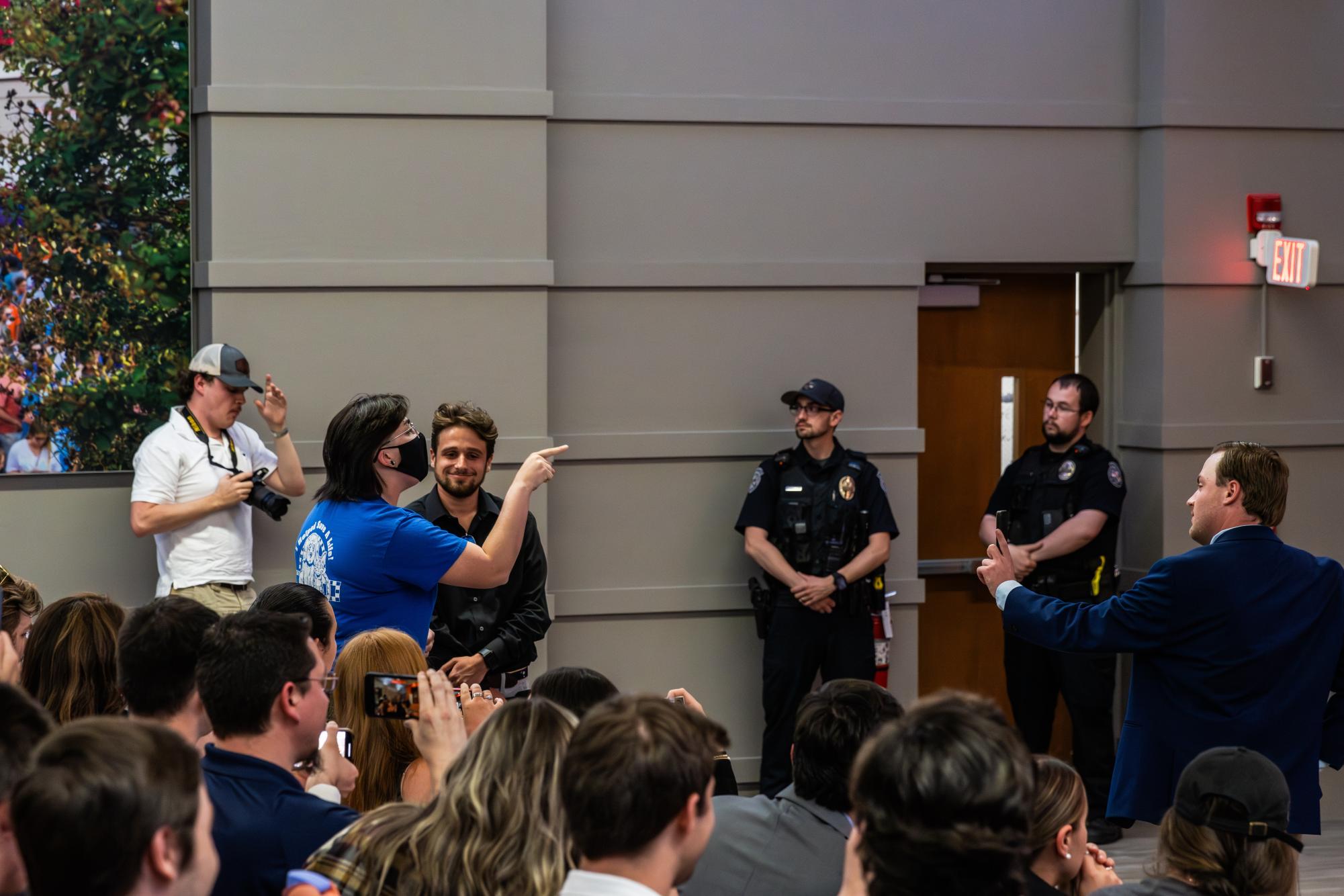 Several protesters were removed by CUPD police officers for chanting "save live, not bullets" during Clemson TPUSA's event hosting Kyle Rittenhouse.