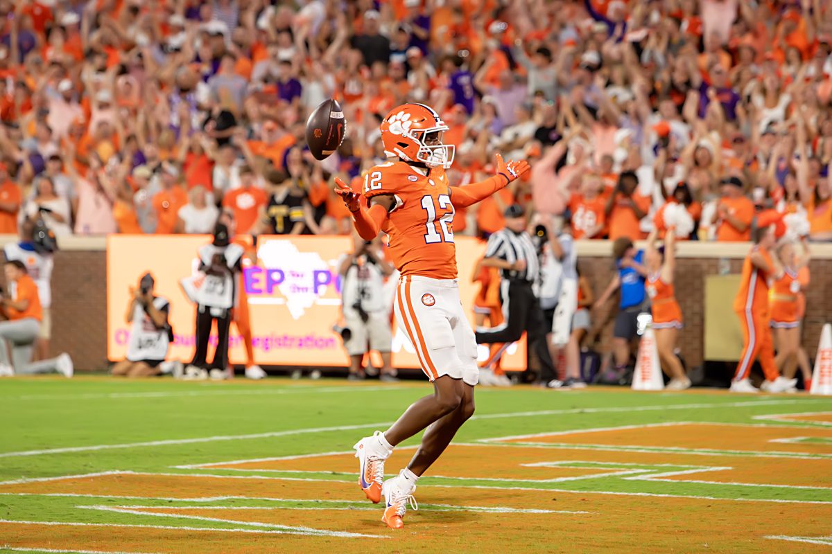 Are you not entertained?: Bryant Wesco Jr. celebrates with the crowd after running in his second touchdown of the night.