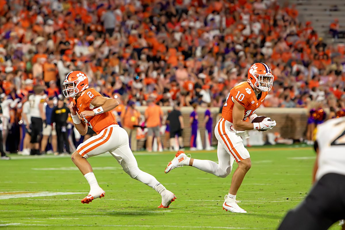 Cade Klubnik (2) hands the ball off to Troy Stellato (10) during Clemson's game against Appalachian State on Sept. 7.