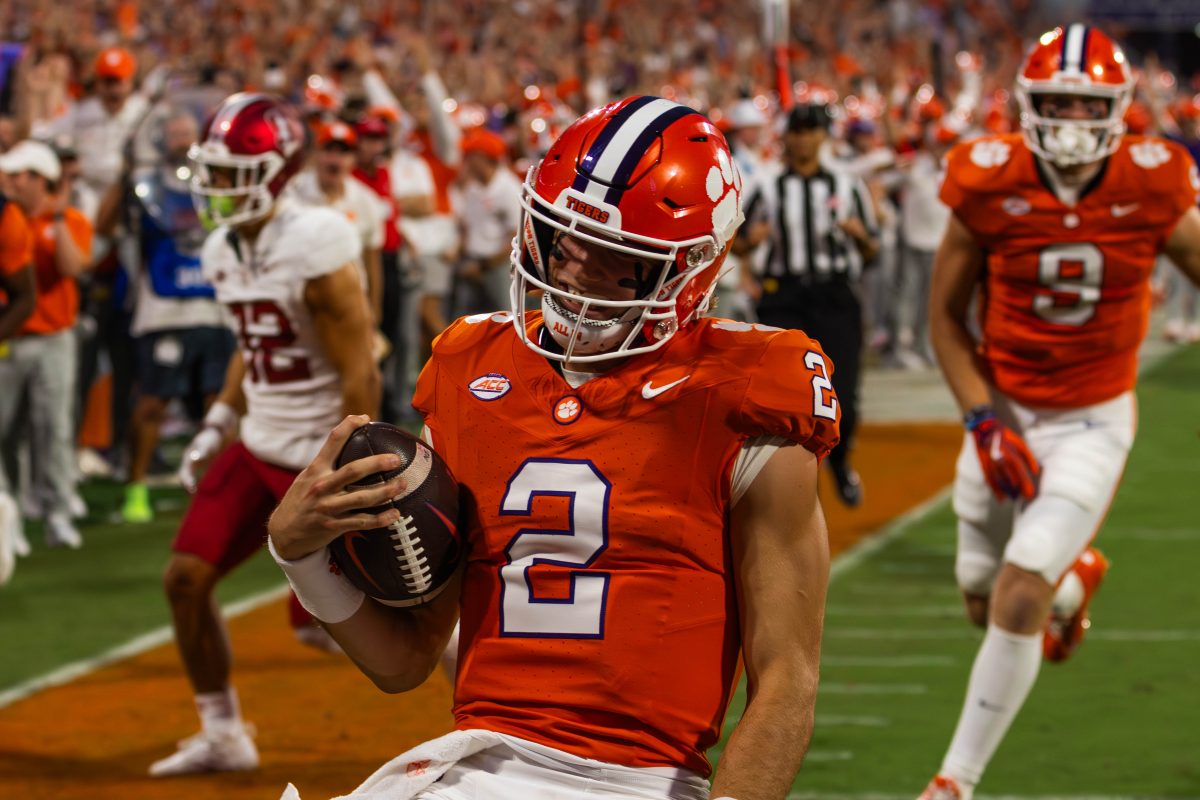 Cade Klubnik (2) ran for 34 yards to the end zone to open up scoring for the Tigers against Stanford on Sept. 28.