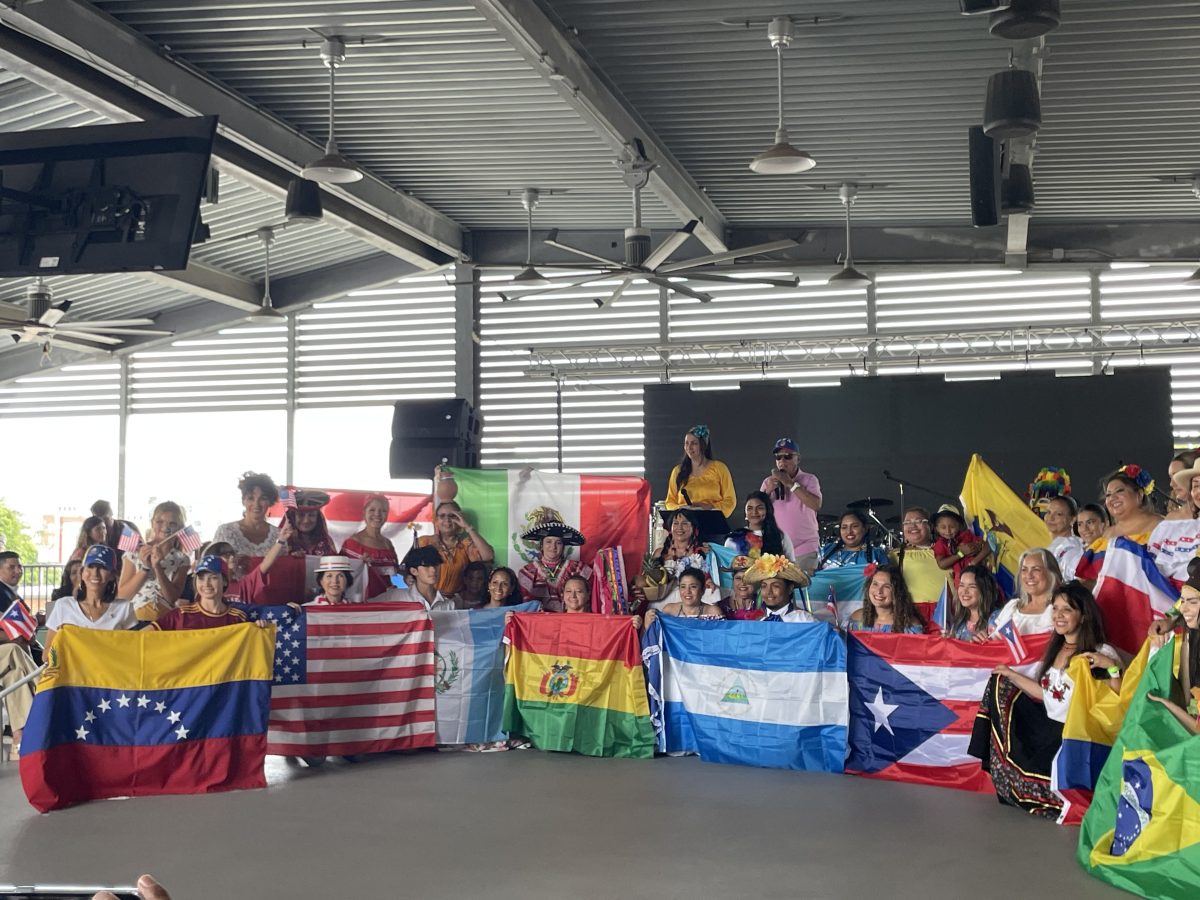 Different Hispanic countries were represented by wearing traditional clothing while holding their flag.