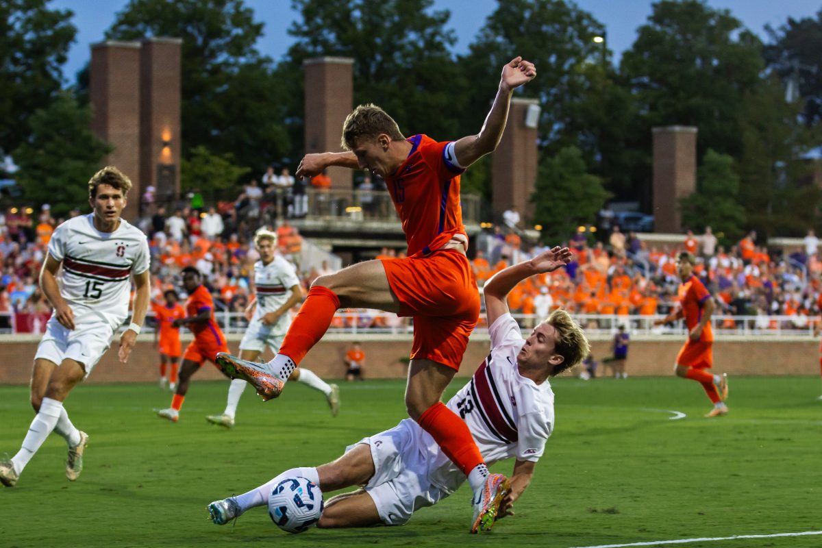 The top 5 matchup was intense down to the final minutes of play, with graduate forward Alex Meinhard dribbling through defenders.