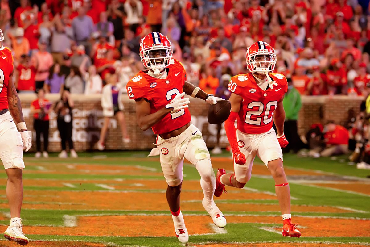 Former Clemson cornerback Nate Wiggins celebrates after recording a game sealing pick-six versus North Carolina last November.