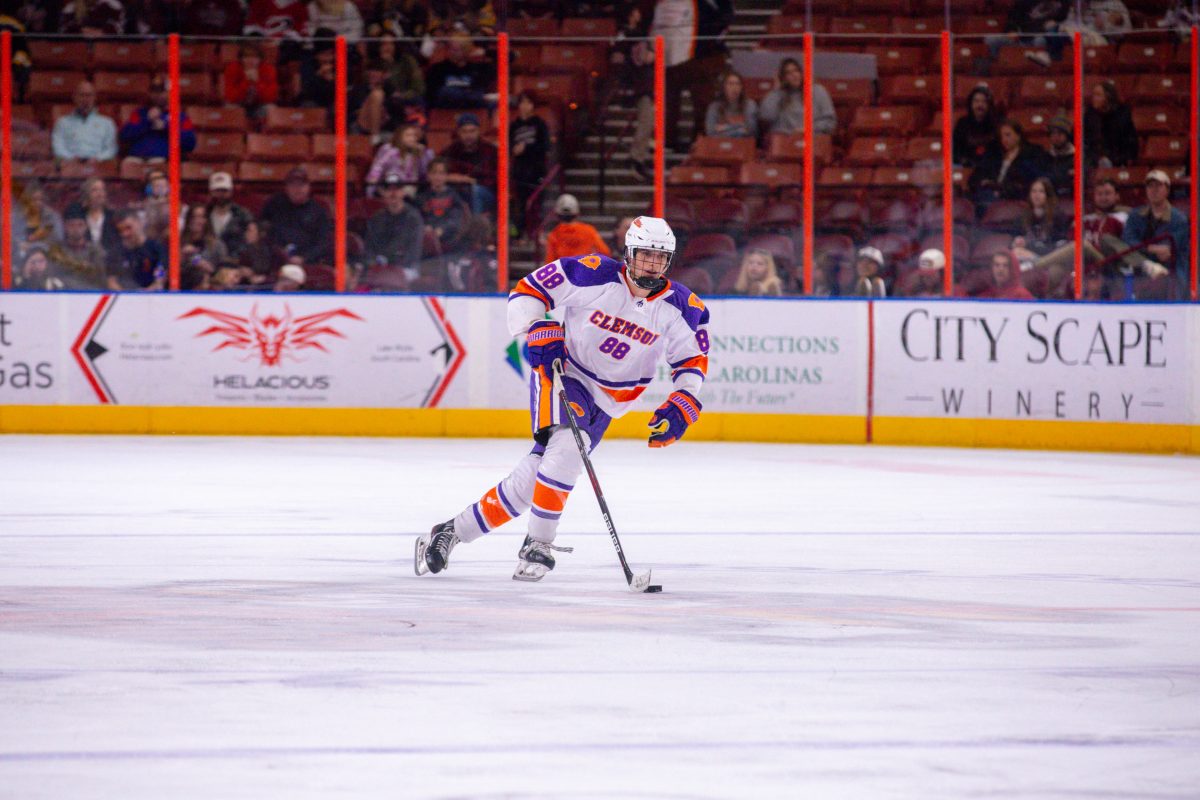 Santiago Diaz skates up the ice during Clemson's game against South Carolina at Bon Secours Wellness Arena last season.