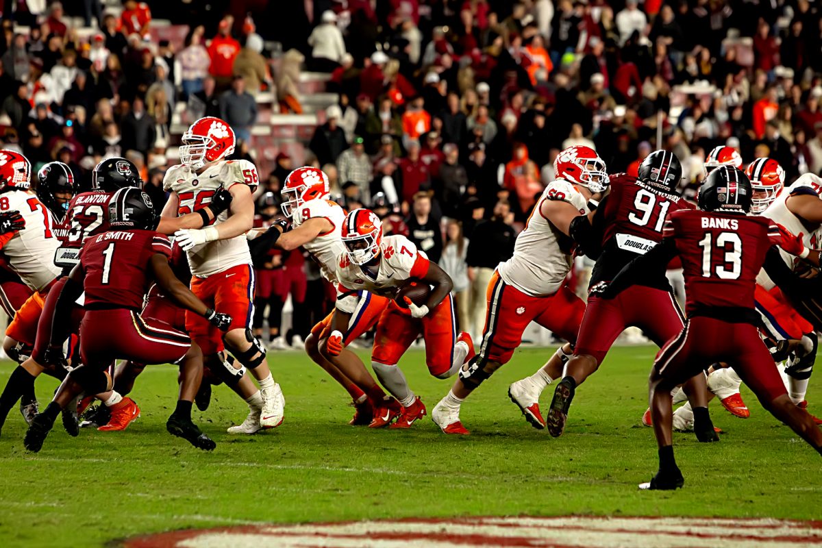 Clemson running back Phil Mafah (7) rushes the ball in Clemson's win over South Carolina in the Palmetto Bowl on Nov. 25, 2023, at Williams-Brice Stadium.