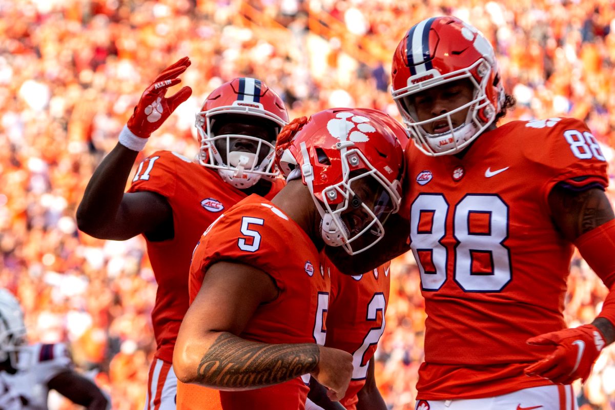 Former Clemson quarterback DJ Uiagalelei (5) celebrates with tight end Braden Galloway (88) against S.C. State on Sept. 11, 2021 at Memorial Stadium. 