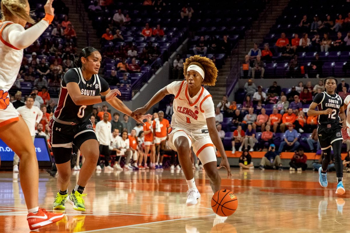 Clemson guard Loyal McQueen (1) drives to the basket in the Tigers' loss to South Carolina on Nov. 20 at Littlejohn Coliseum.