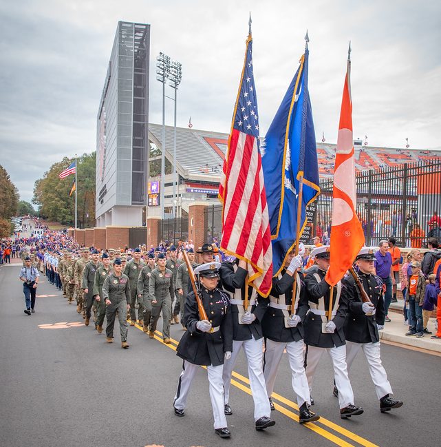 Members of the Clemson University ROTC honor guard, the Pershing Rifles, which includes both Army and Air Force ROTC cadets lead the parade annually during the Military Appreciation Game. 