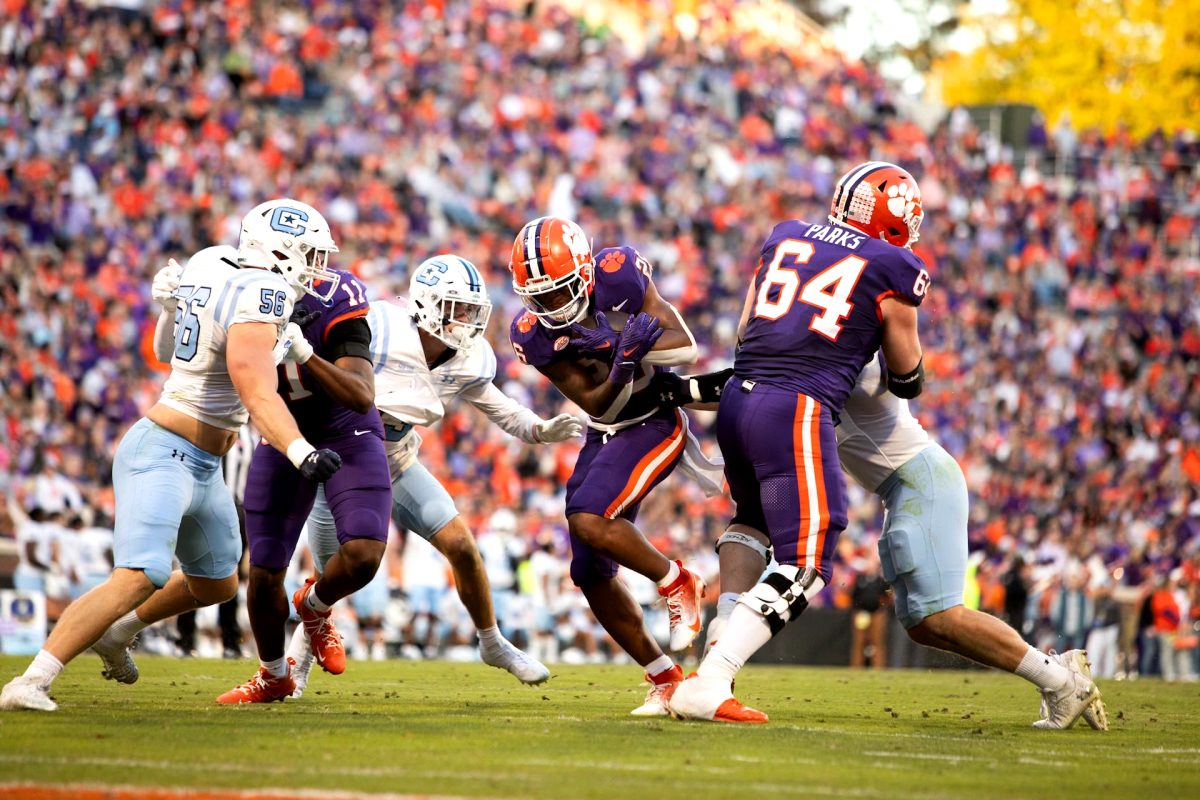 Clemson running back Jay Haynes (26) evades defenders in Clemson's win over The Citadel at Memorial Stadium on Nov. 23. 