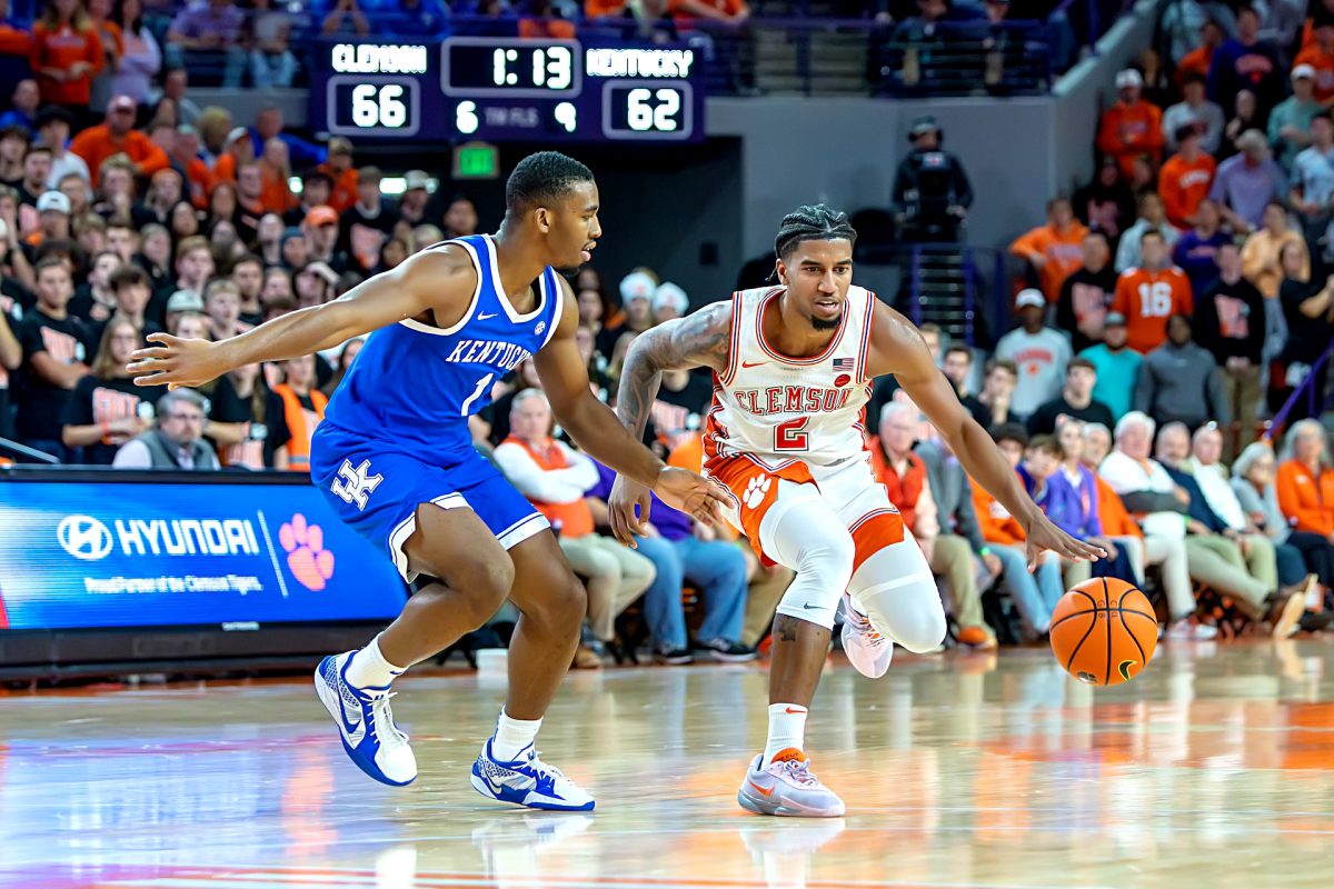 Clemson guard Dillon Hunter (2) attempts to dribble past Kentucky defender Lamont Butler (1) in Clemson's win over Kentucky at Littlejohn Coliseum on Dec. 3. 