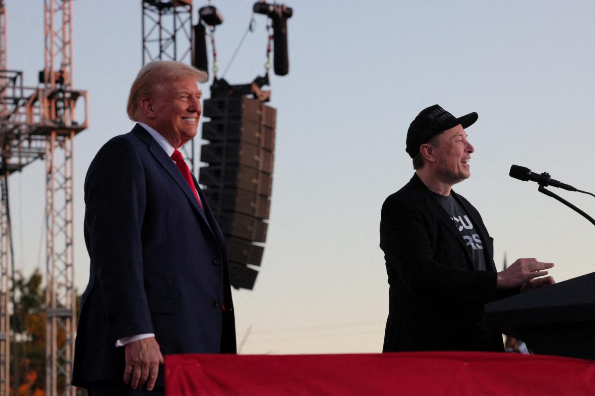 Elon Musk, owner of Tesla and one of Donald Trump's Department of Government Efficiency nominations, speaks at a Trump rally on Oct. 5.