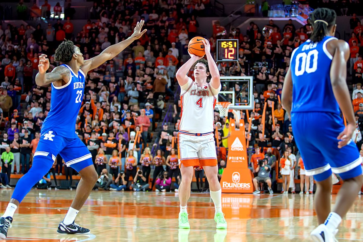 Clemson forward Ian Schieffelin (4) attempts a shot in the Tigers' upset win over No. 4 Kentucky 70-66 at Littlejohn Coliseum on Tuesday night. 