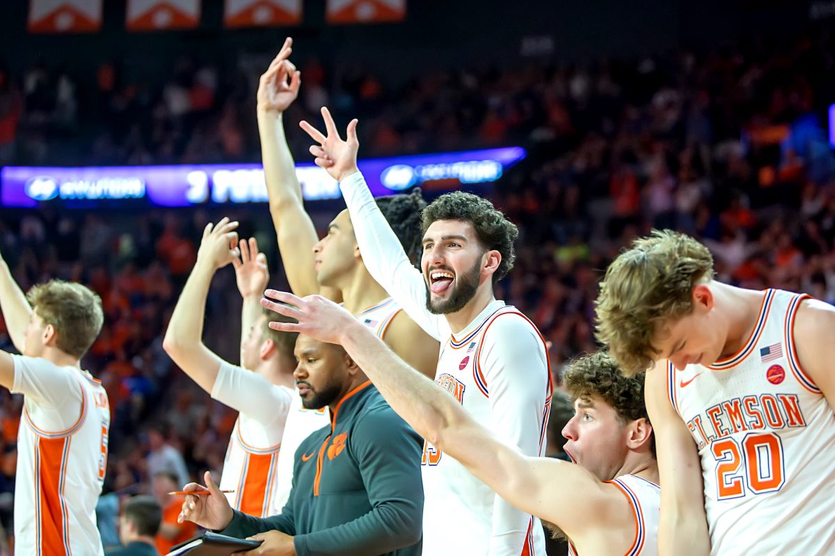 The Clemson bench celebrates during the Tigers' 70-66 win over Kentucky at Littlejohn Coliseum on Dec. 3, 2024. 