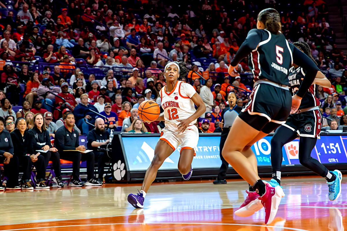 Clemson guard Mia Moore drives to the hoop in Clemson's loss to South Carolina at Littlejohn Coliseum on Nov. 20, 2024. 