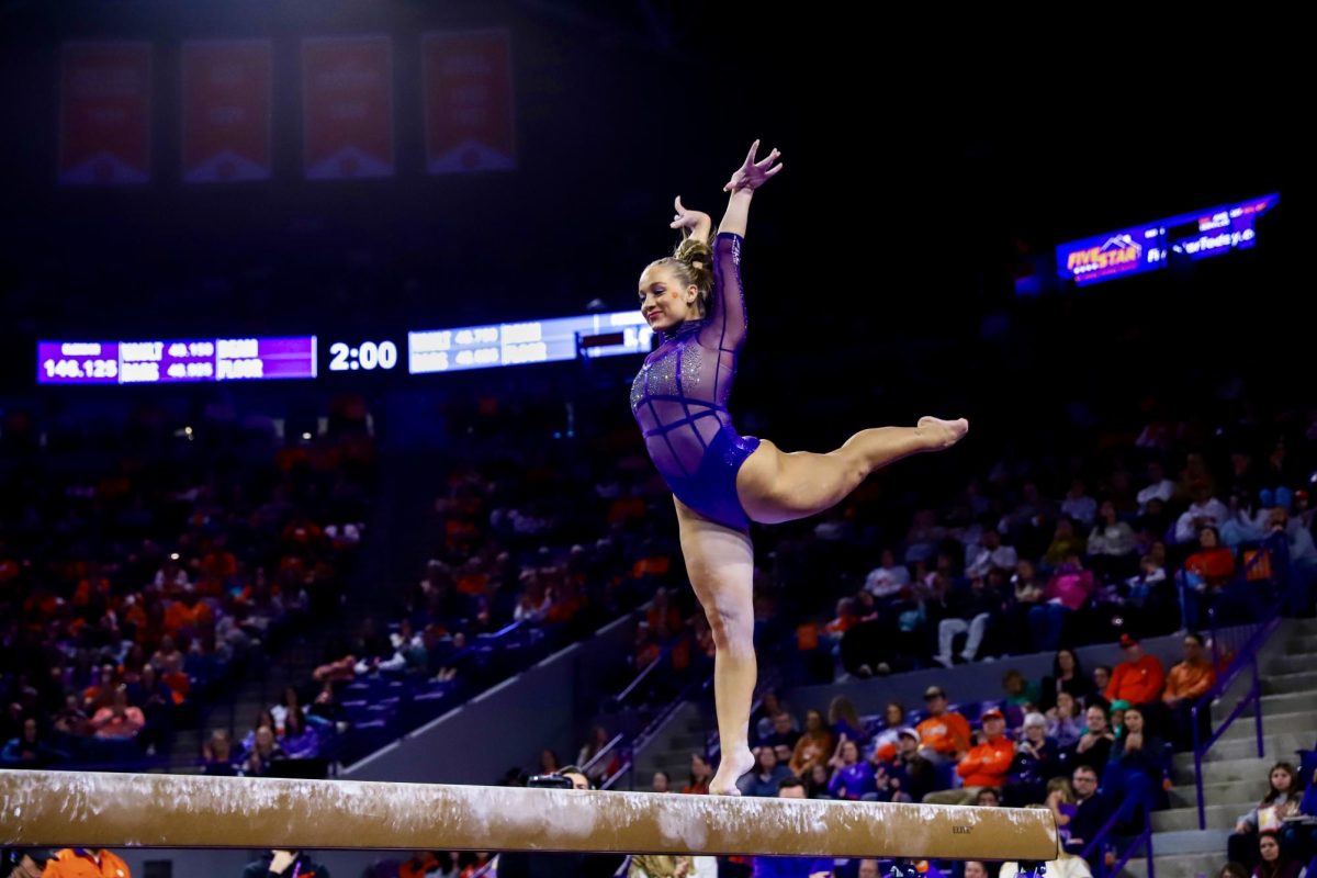 Redshirt junior Kielyn McCright performs her beam routine against Pittsburgh on Jan. 21, 2024, at Littlejohn Coliseum.