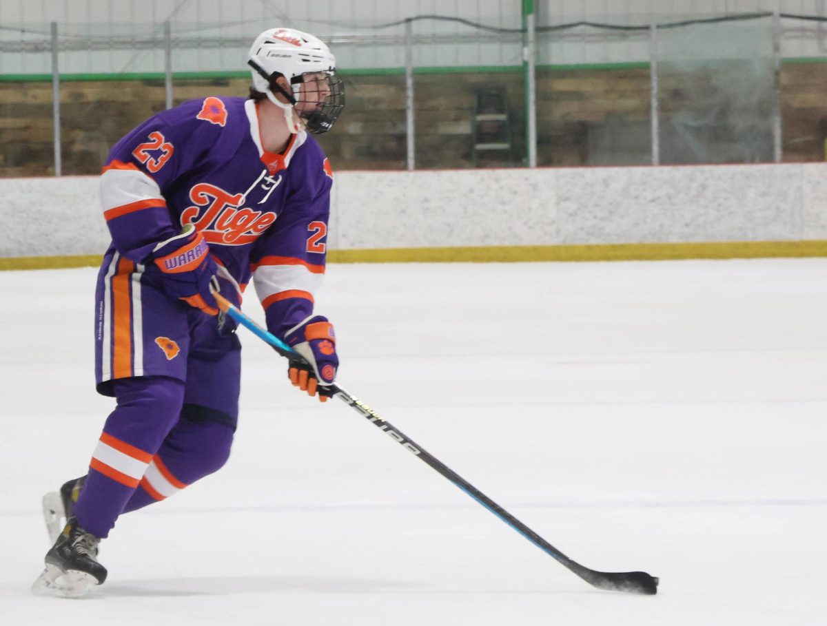 Clemson defenseman Cam Iacobelli skates the puck down the ice during Clemson's home opener against Alabama-Huntsville on Jan. 11.