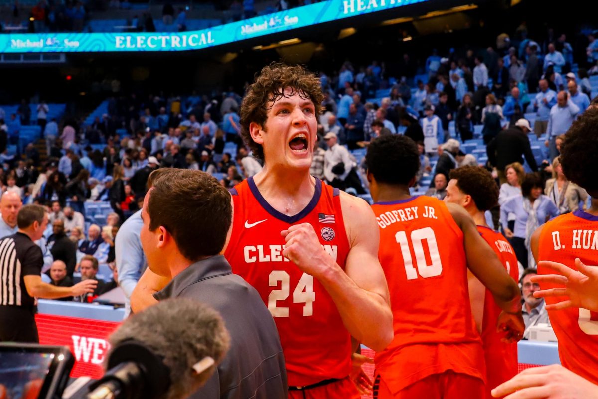 Former Clemson center PJ Hall celebrates after upsetting the North Carolina Tar Heels 80-76 in Chapel Hill, North Carolina, on Feb. 6, 2024.