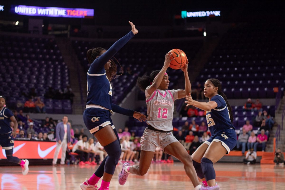 Clemson guard Mia Moore sends a pass in the Tigers' win over Georgia Tech on Feb. 13 at Littlejohn Coliseum. 