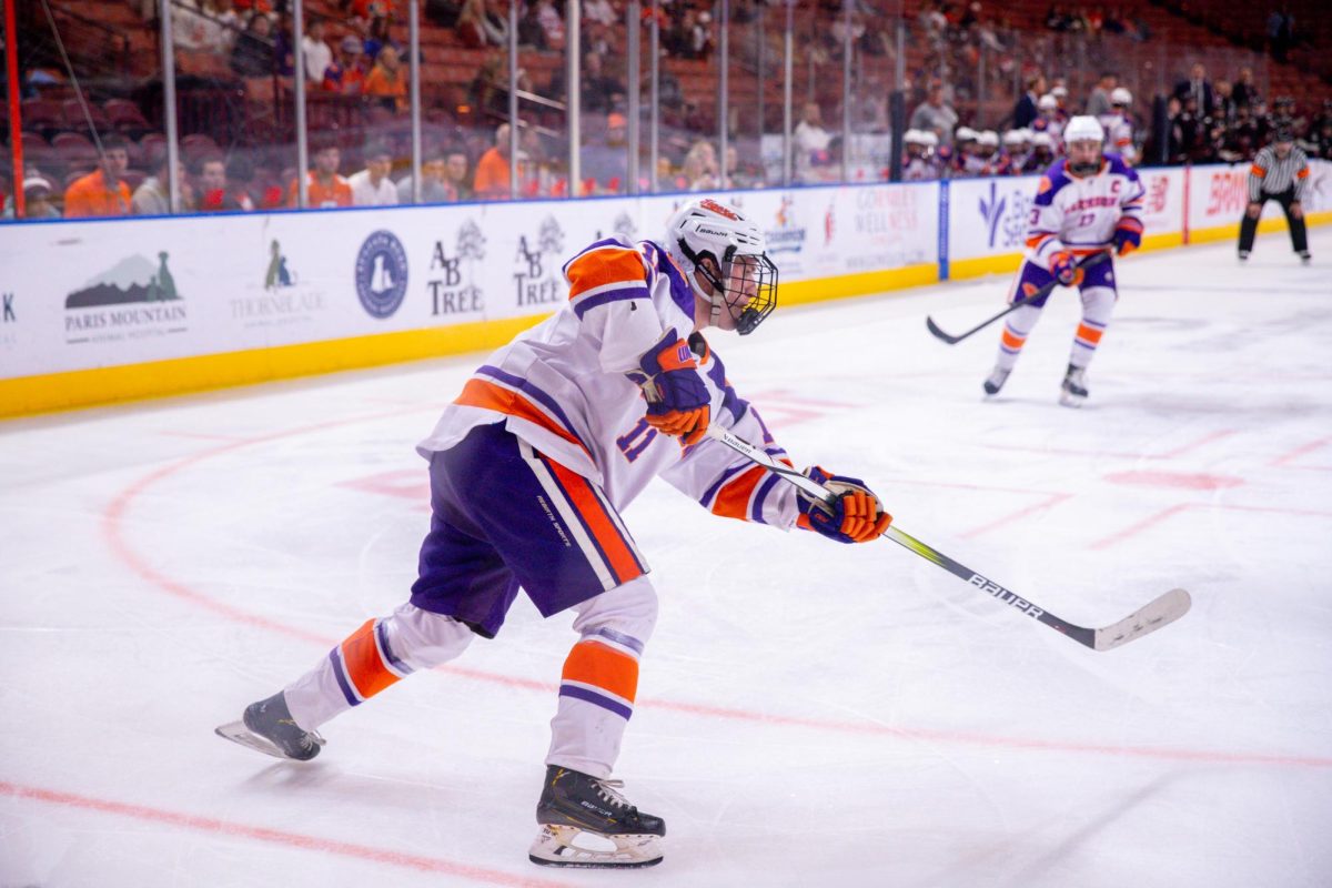 Forward Sully Kopf shoots the puck during Clemson's game against South Carolina on Feb. 24, 2024.