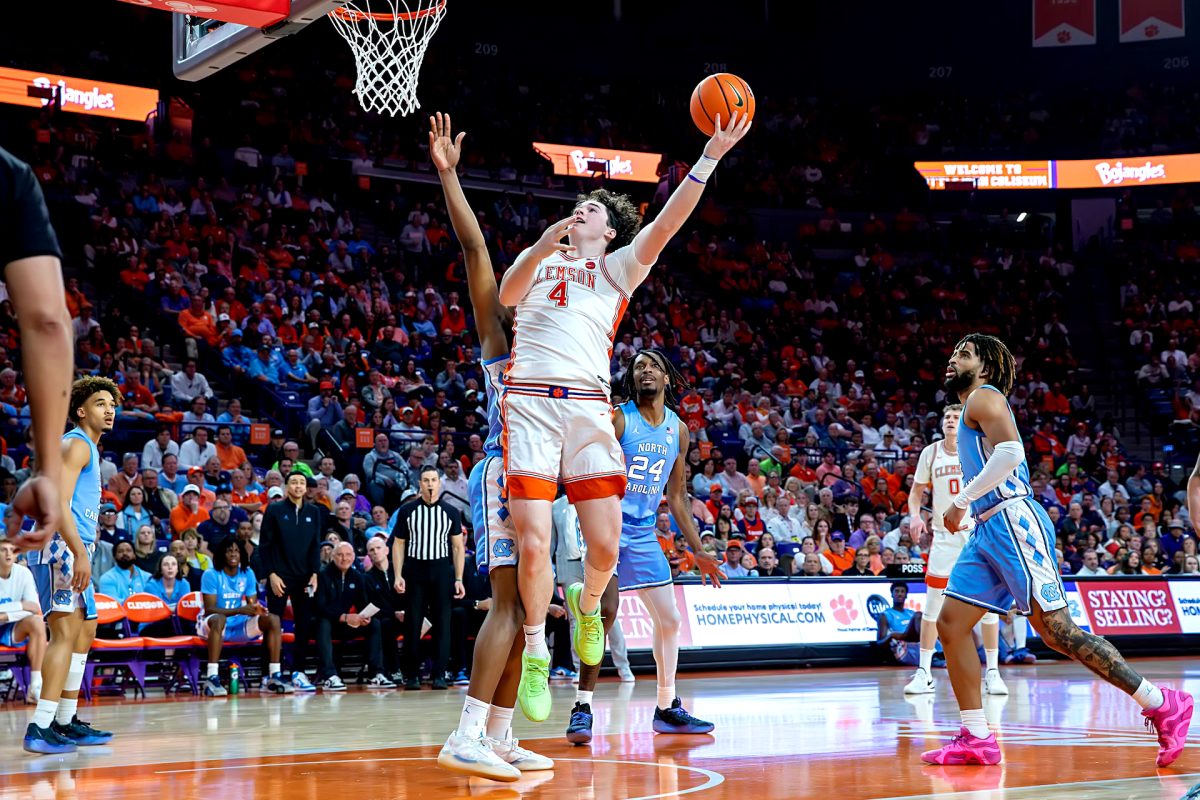 Clemson forward Ian Schieffelin (4) attempts a hook shot in the Tigers' win over North Carolina on Feb. 10 at Littlejohn Coliseum. 