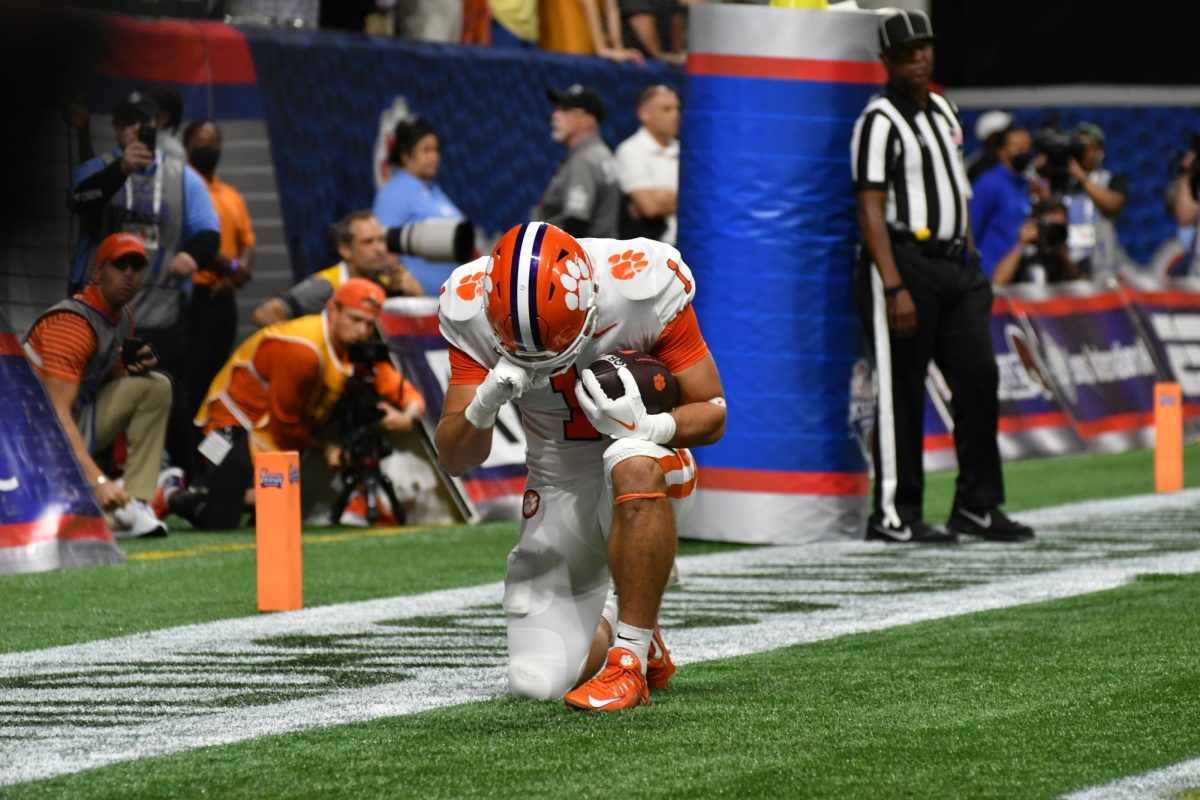 Former Clemson running back and now-Philadelphia Eagle Will Shipley prays after scoring a touchdown against Georgia Tech in 2022.