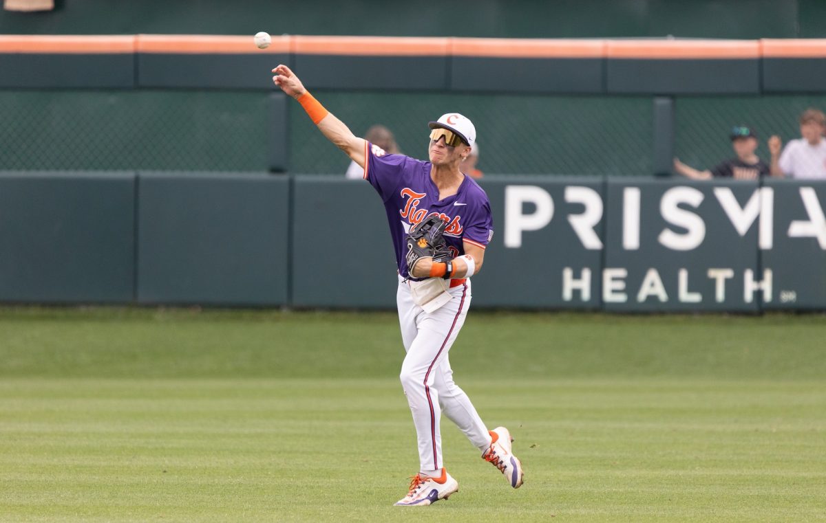 Clemson outfielder Cam Cannarella throws the ball back into the infield in the Tigers' series against Boston College on May 18, 2024. 