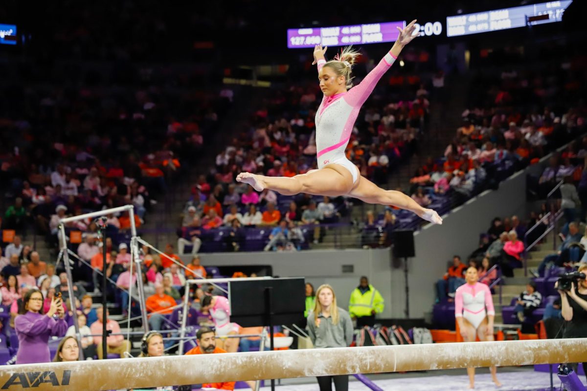 Sierra Church performs her beam routine, scoring her season best of 9.900. 