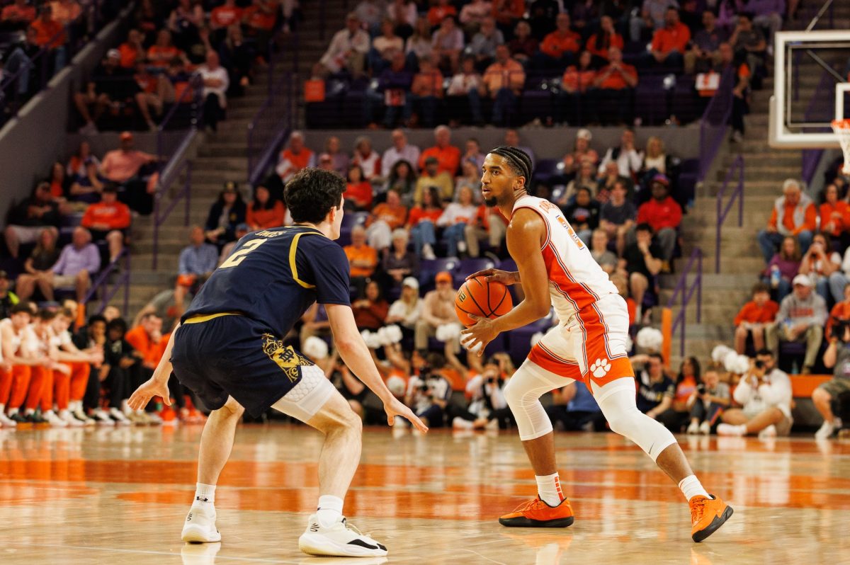 Clemson guard Dillon Hunter dribbles the ball in the Tigers' win over Notre Dame on Feb. 26 at Littlejohn Coliseum.