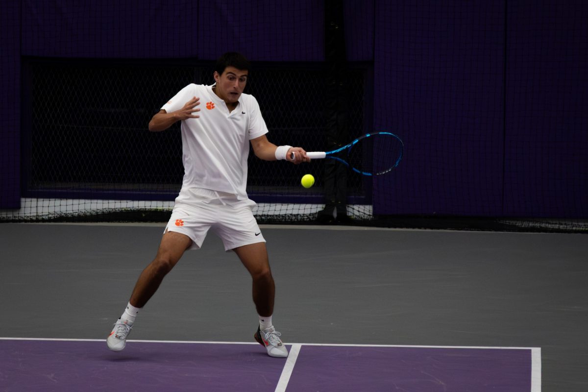 Marko Mesarovic returns a rally in Clemson's win over Notre Dame at the Duckworth Family Tennis Facility on March 2.