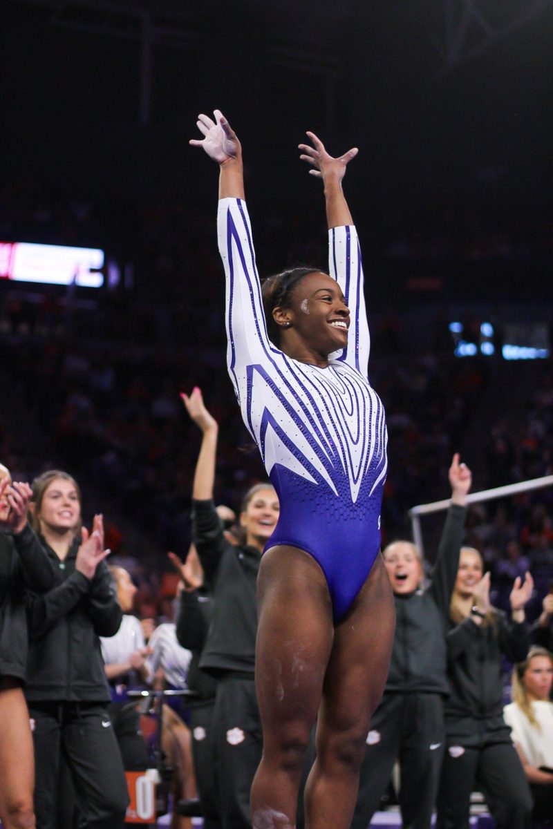 Brie Clark sticks her landing on floor, where she would later become the first collegiate gymnast to ever complete the Biles 1.