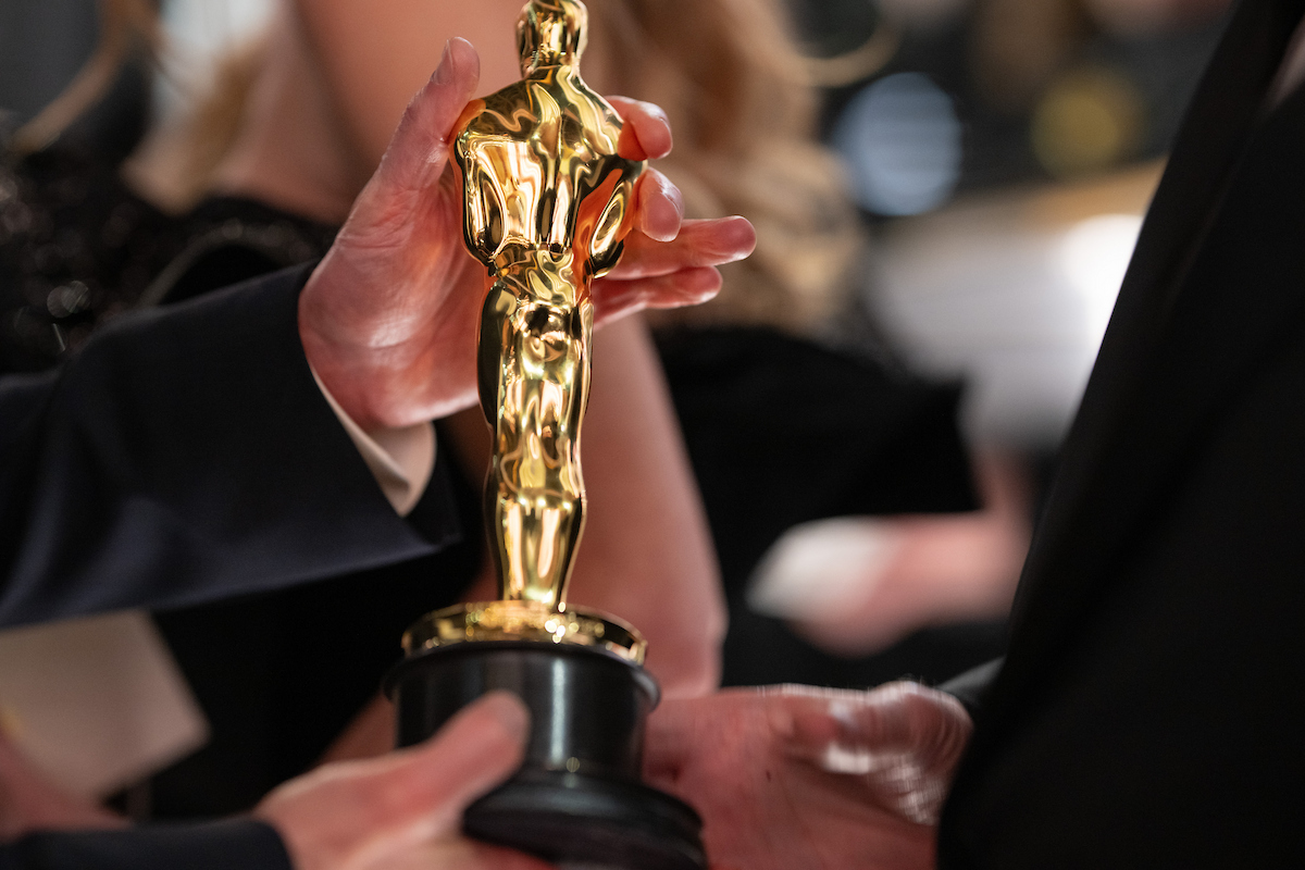 Billy Crystal and Meg Ryan presented the academy award for best picture to Sean Baker's "Anora."