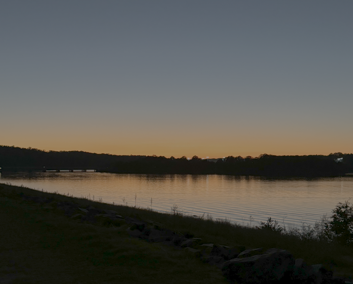 Walking the Dikes at sunset is a magical experience, as Lake Hartwell reflects a Clemson orange sunset.