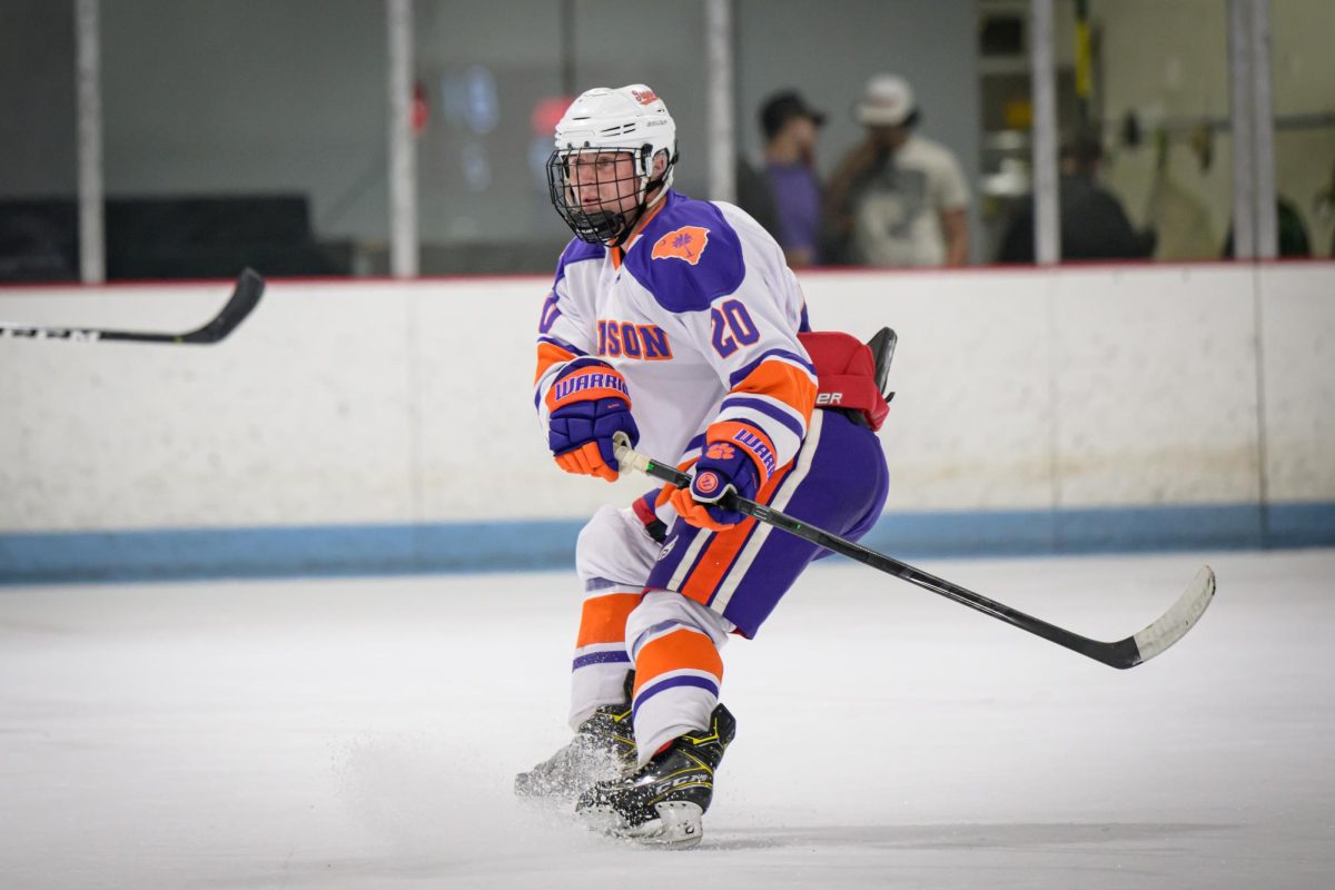 Patrick O'Brien (20) eyes the puck during Clemson's game against Coastal Carolina on Sept. 29, 2023.