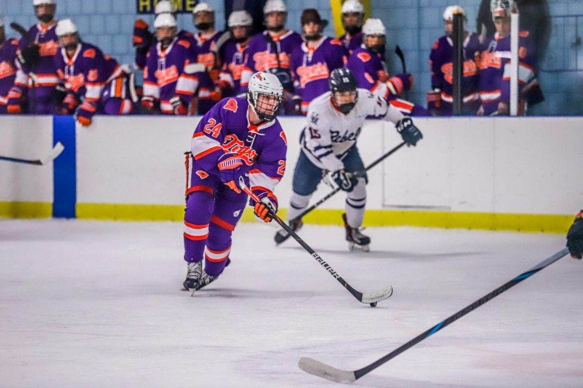 Ethan Callahan (24) moves the puck towards the net during Clemson's game against Ole Miss on Feb. 1.