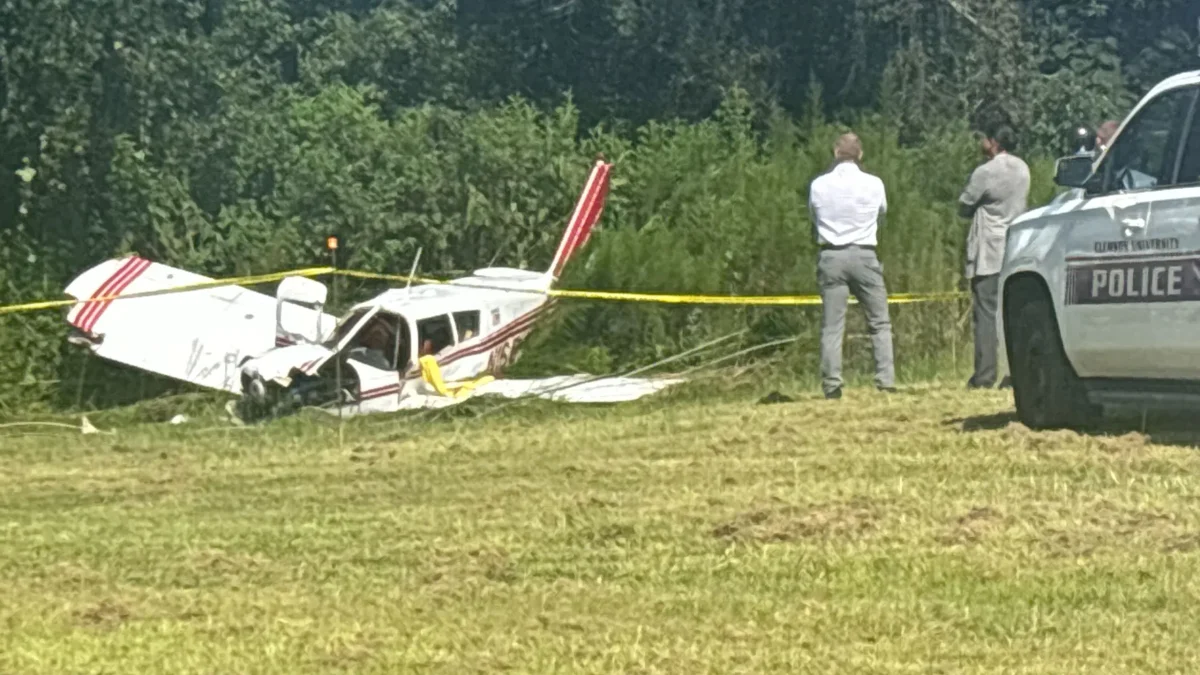 A traffic signal and several powerlines were damaged from the plane crash.