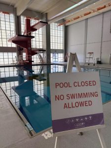 Fike’s dive platforms loom above the pool, taunting students from behind a "Pool Closed" sign.