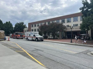 Emergency vehicles were seen outside of Brackett Hall this morning.