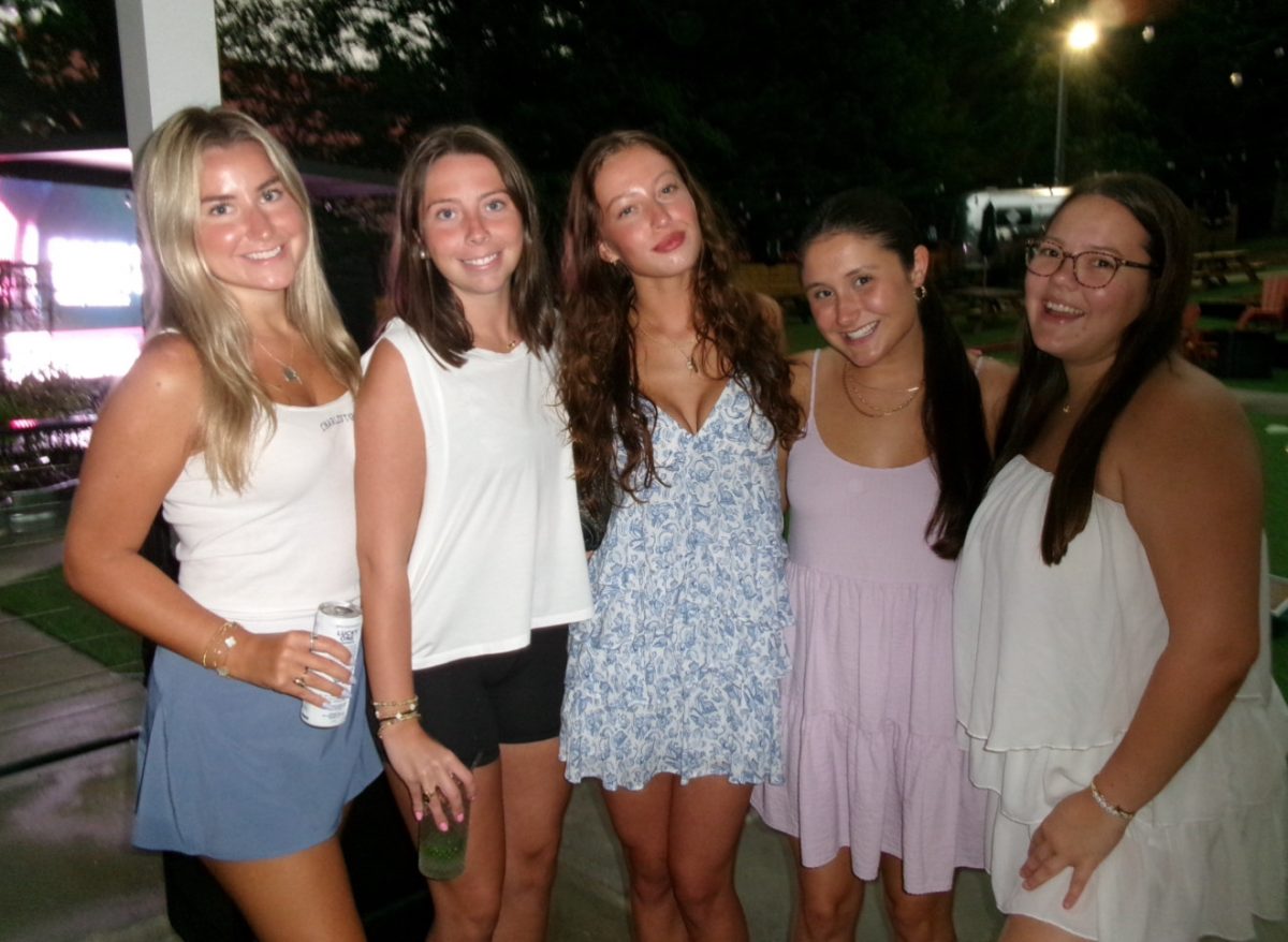 Nicole Abraham and ILF members pose for a picture at the fundraising event they organized this past June.