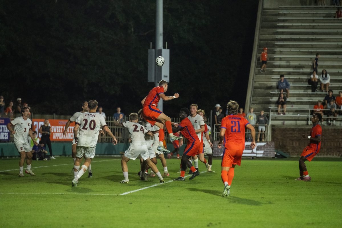 Clemson players crash the box on a corner kick against Elon on Oct. 7 at Historic Riggs Field.