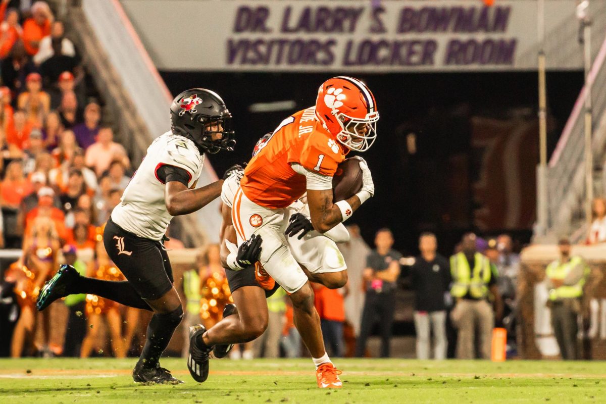 Wide receiver T.J. Moore hauls in a pass in a 33-21 loss to Louisville on Nov. 2, 2024. 