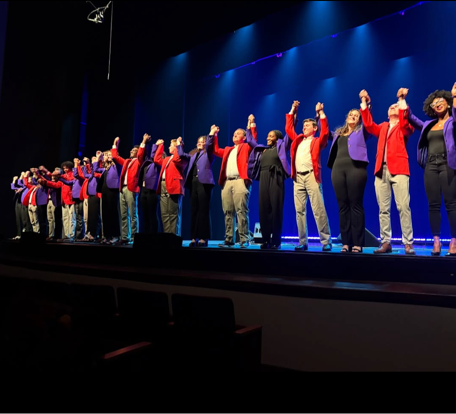 TakeNote and Tigeroar bow after alternating the stage with their a cappella productions.