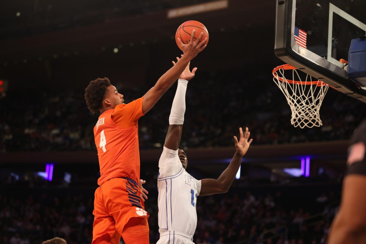 Butta Johnson rises up for a finger roll layup against BYU on Dec. 9, 2025.
